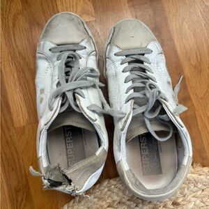 Golden Goose with flaw on the back